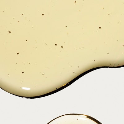 liquide beige avec petites bulles
